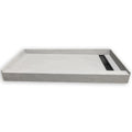 Closeout 32 x 60 in shower pan with right trench drain, grey skim coated surface, angled view showing the curb