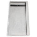 Closeout 48 x 60 in shower pan with right trench drain, grey skim coated surface, front view showing the trench and splash wall